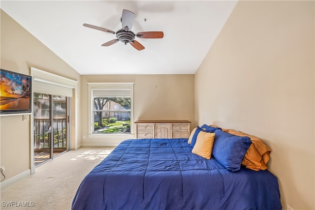 bedroom with light colored carpet, ceiling fan, vaulted ceiling, and access to outside