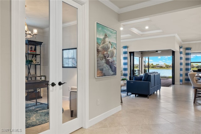 hallway with crown molding, french doors, a chandelier, and coffered ceiling