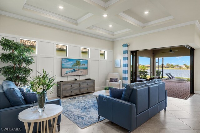 living room with coffered ceiling, crown molding, ceiling fan, light tile patterned floors, and beam ceiling