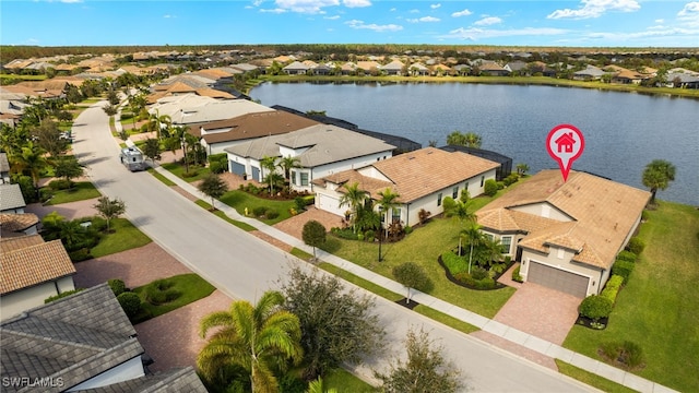 drone / aerial view featuring a water view