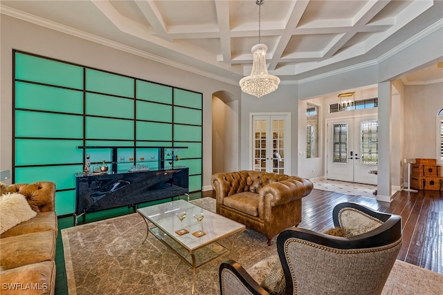 living room featuring french doors, coffered ceiling, beam ceiling, crown molding, and dark hardwood / wood-style flooring