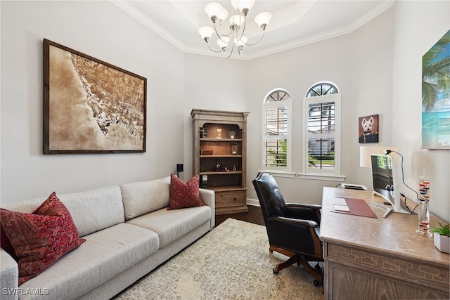 home office with crown molding, hardwood / wood-style flooring, and an inviting chandelier