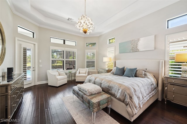 bedroom with access to exterior, ornamental molding, dark wood-type flooring, a high ceiling, and a notable chandelier