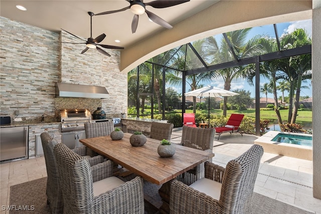 view of patio featuring area for grilling, a lanai, grilling area, and ceiling fan