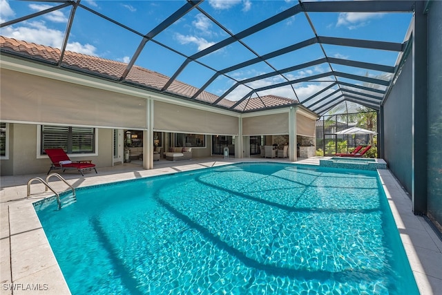 view of pool with a patio area, an outdoor living space, and glass enclosure