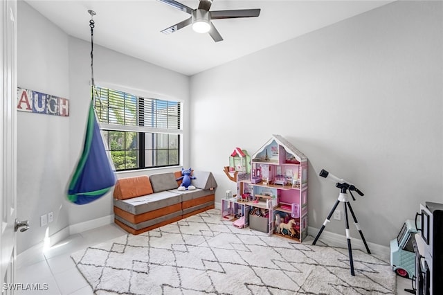 playroom with light tile patterned flooring and ceiling fan