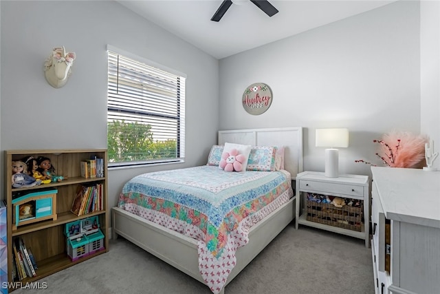 bedroom featuring ceiling fan and light colored carpet