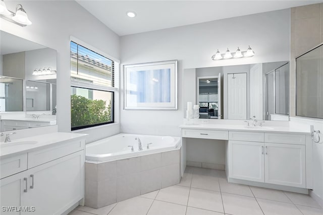 bathroom with vanity, separate shower and tub, and tile patterned floors