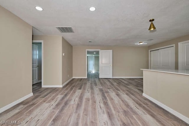 empty room featuring light hardwood / wood-style floors