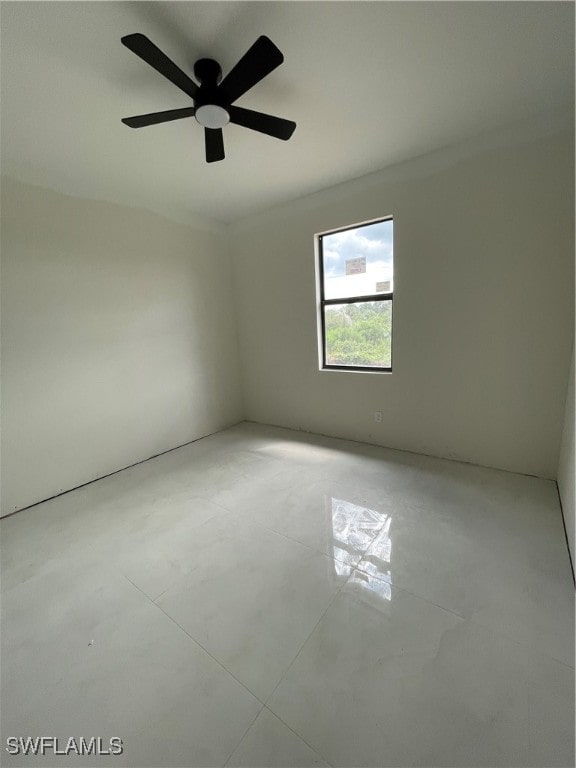 unfurnished room with ceiling fan