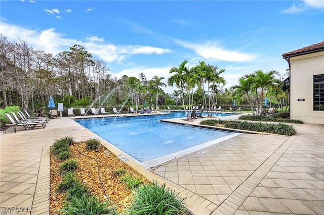 community pool featuring a patio