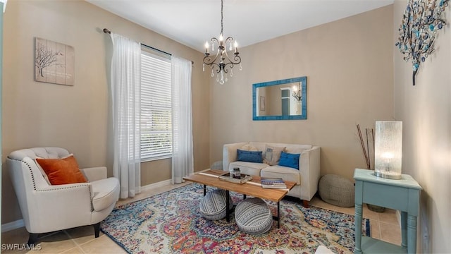 living area with tile patterned flooring and an inviting chandelier