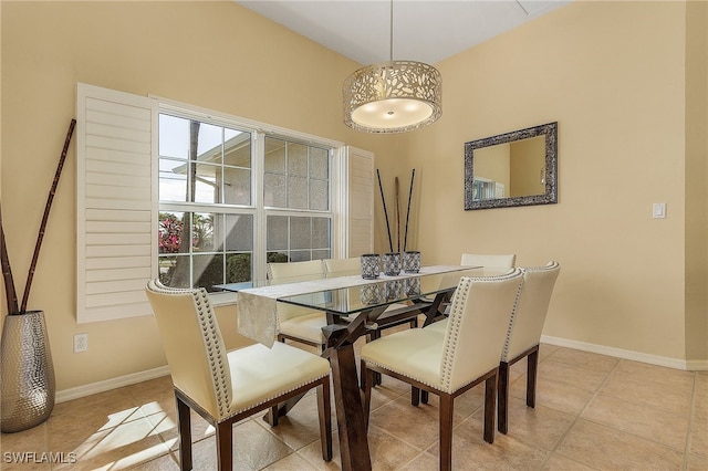 dining area featuring light tile patterned floors