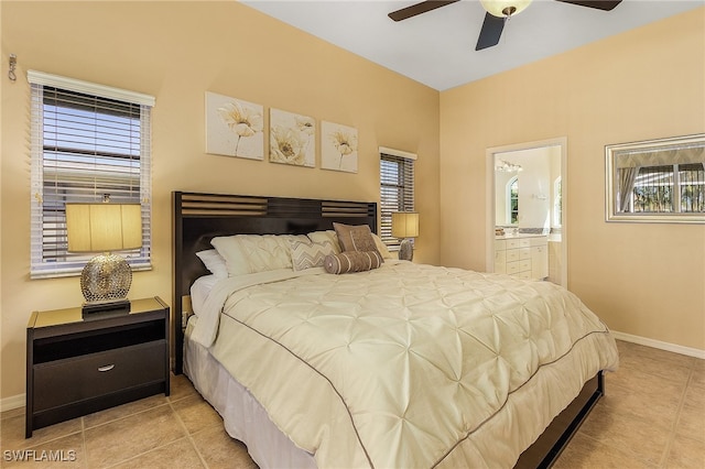 tiled bedroom featuring ceiling fan and connected bathroom