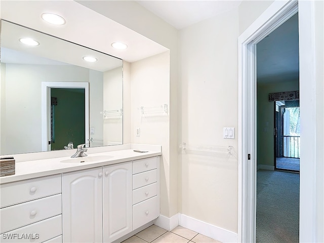 bathroom with vanity and tile patterned flooring