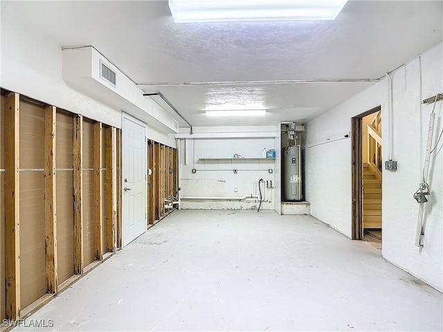 basement featuring water heater