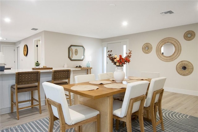 dining area featuring light hardwood / wood-style flooring