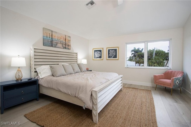 bedroom with light hardwood / wood-style flooring