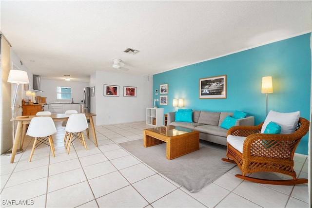 living room with light tile patterned floors