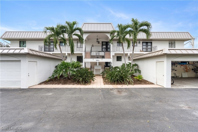 view of front of property with a balcony