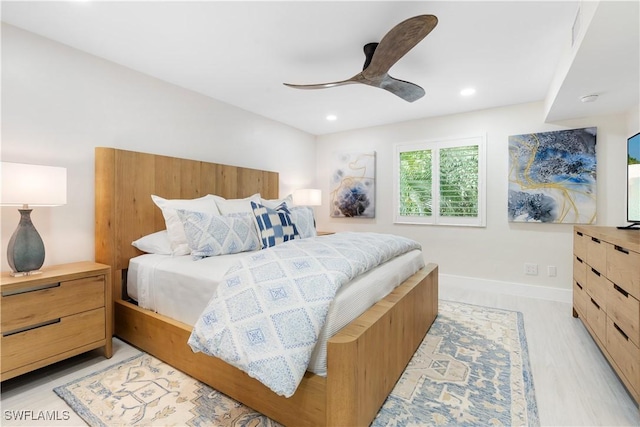 990 8th St S Unit 1B, Naples, FL 34102 - bedroom featuring light wood-type flooring, recessed lighting, a ceiling fan, and baseboards