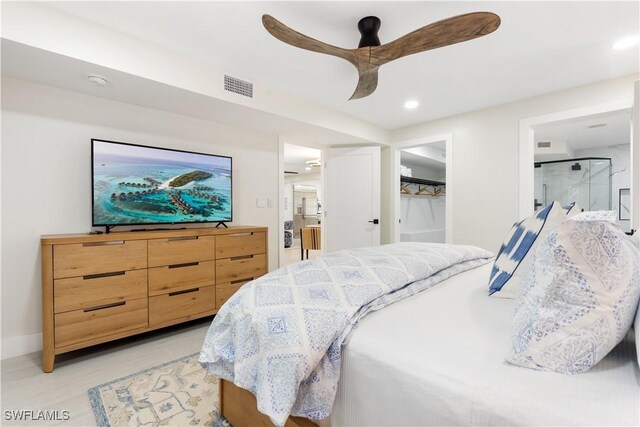 990 8th St S Unit 1B, Naples, FL 34102 - bedroom with recessed lighting, connected bathroom, ceiling fan, baseboards, and visible vents