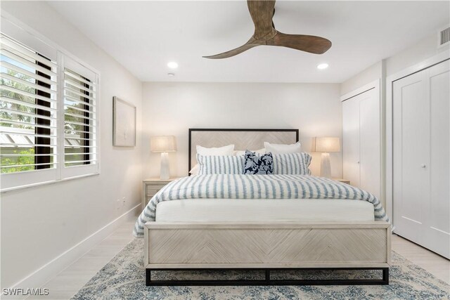 990 8th St S Unit 1B, Naples, FL 34102 - bedroom featuring baseboards, recessed lighting, visible vents, and multiple closets