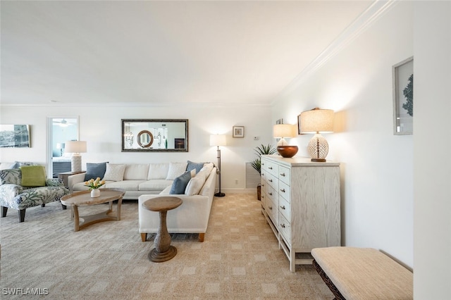 living room featuring crown molding and light carpet