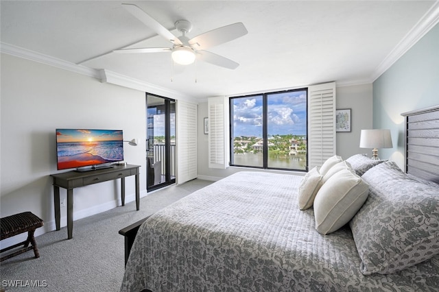 carpeted bedroom featuring access to exterior, ornamental molding, and ceiling fan