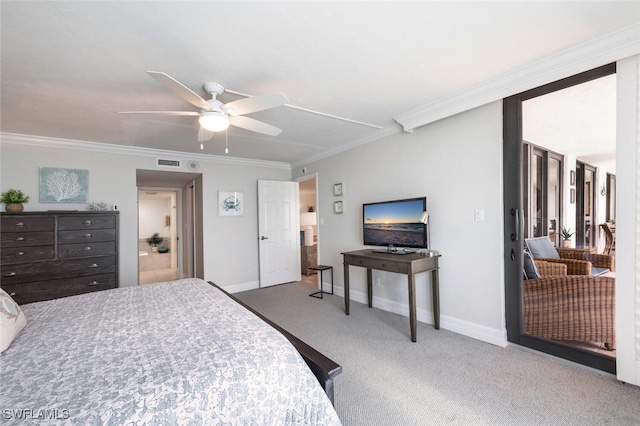 bedroom featuring connected bathroom, crown molding, ceiling fan, and carpet flooring