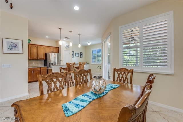 tiled dining space with sink