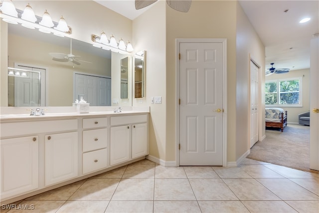 bathroom featuring tile patterned flooring and vanity