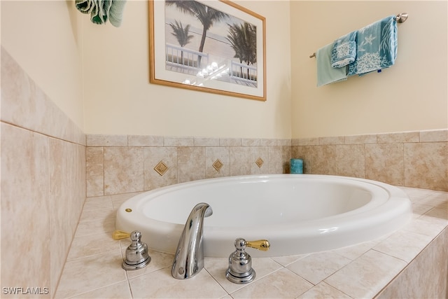 bathroom with tiled bath