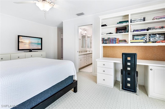 bedroom with ceiling fan and ensuite bathroom