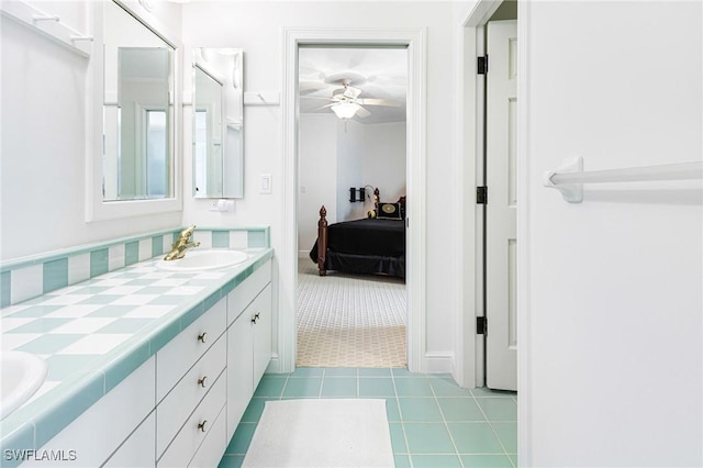 bathroom with tile patterned floors, ceiling fan, and vanity