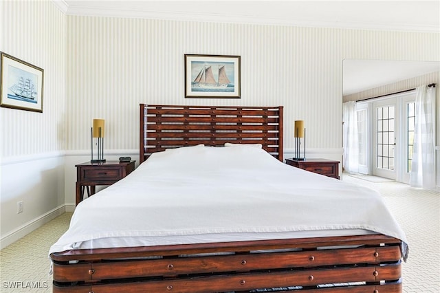 carpeted bedroom featuring crown molding