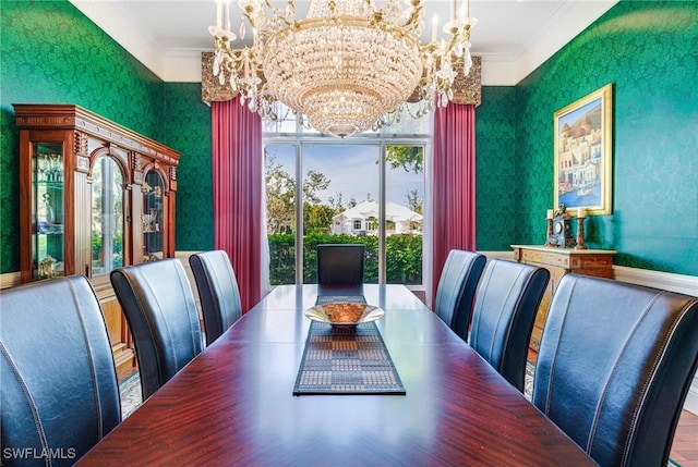 dining room with crown molding, a healthy amount of sunlight, and a notable chandelier