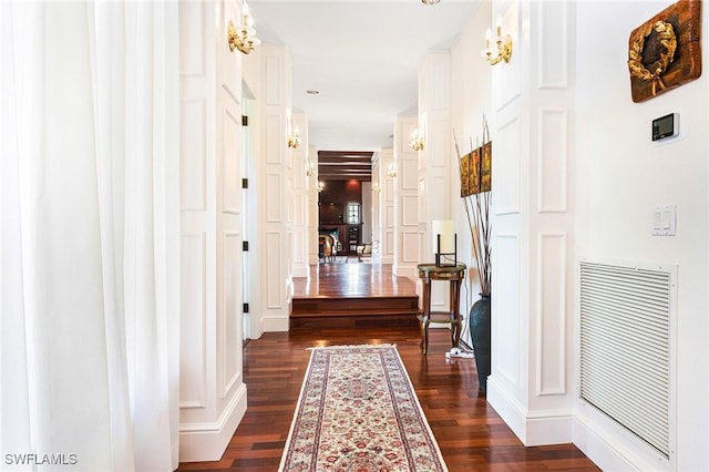 corridor featuring dark wood-type flooring