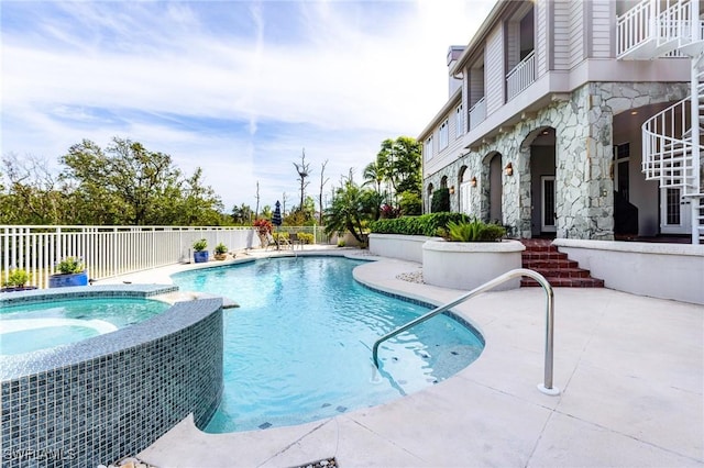 view of pool featuring a patio area