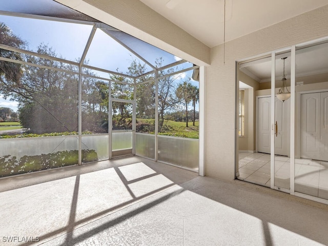 unfurnished sunroom with plenty of natural light