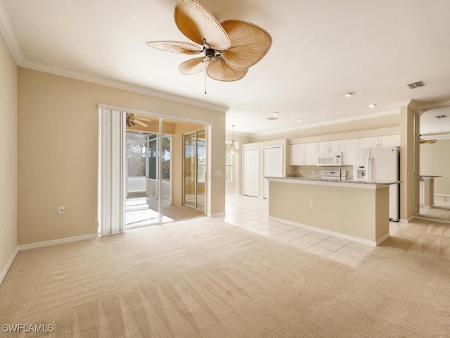 unfurnished living room with ceiling fan, ornamental molding, and light carpet