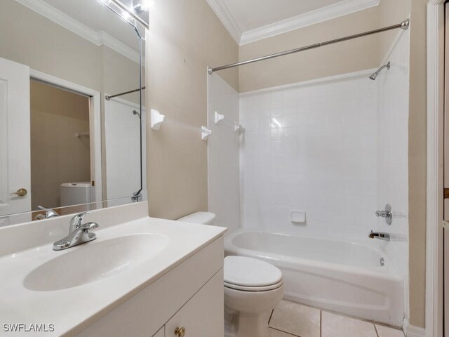 full bathroom with tile patterned floors, ornamental molding, vanity, washtub / shower combination, and toilet