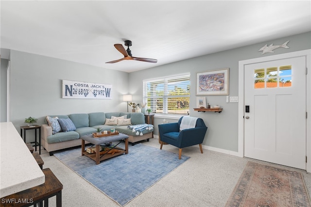 living room featuring ceiling fan