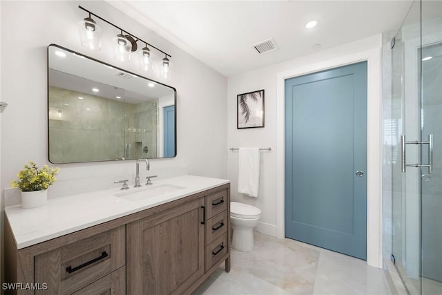 bathroom with toilet, visible vents, a shower stall, and vanity