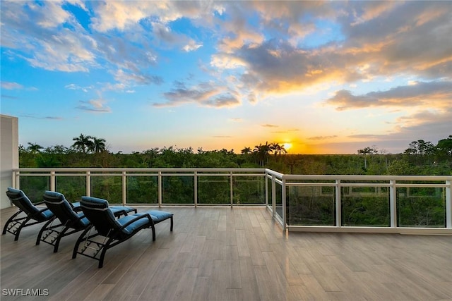 patio terrace at dusk with a balcony