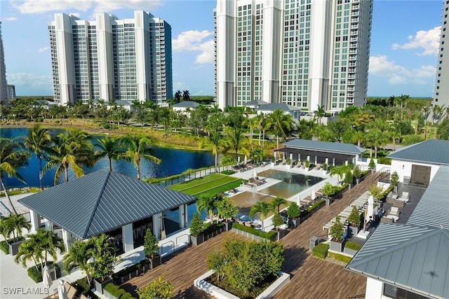 birds eye view of property with a water view