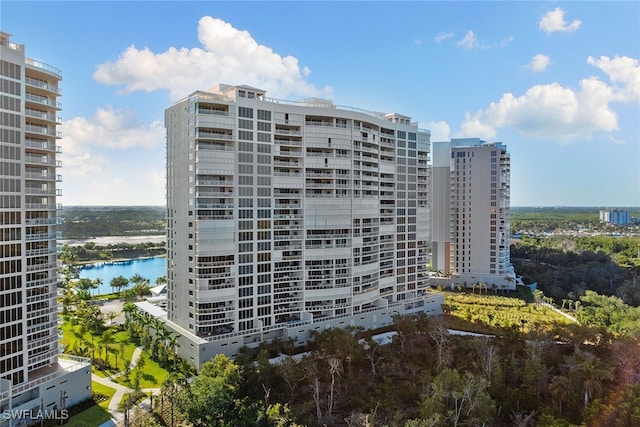 view of building exterior with a water view