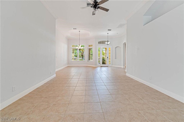 spare room with light tile patterned flooring, ceiling fan with notable chandelier, and ornamental molding