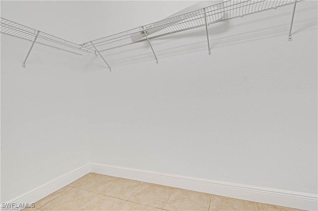 walk in closet featuring tile patterned floors