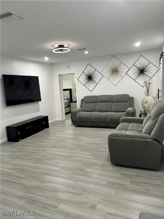 living room featuring light wood-type flooring